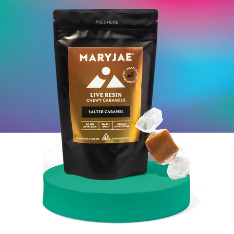 Maryjae live resin chewy caramels packaging with a caramel piece on a colorful gradient background